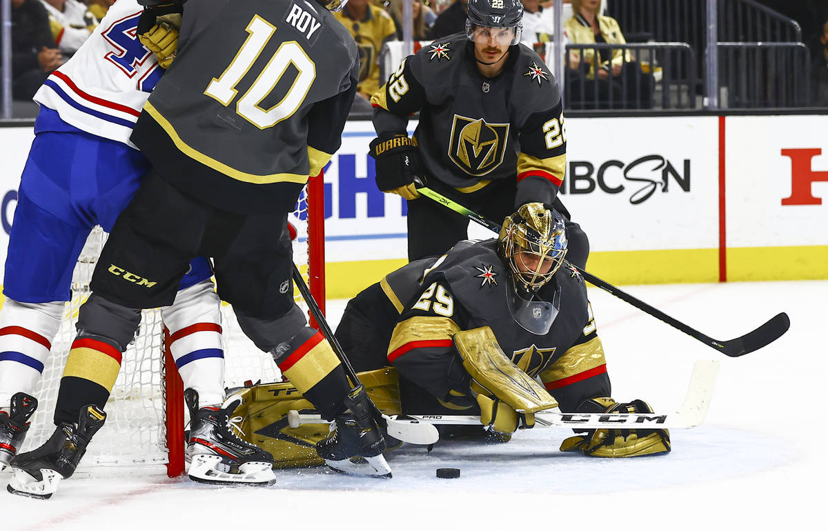 Golden Knights goaltender Marc-Andre Fleury (29) reaches out to stop the puck against the Montr ...