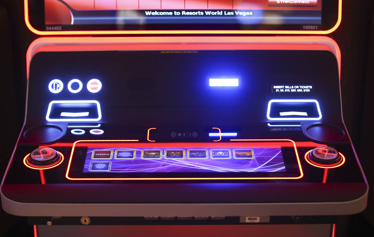 A slot machine with wireless phone charging capabilities is seen on the casino floor is seen du ...