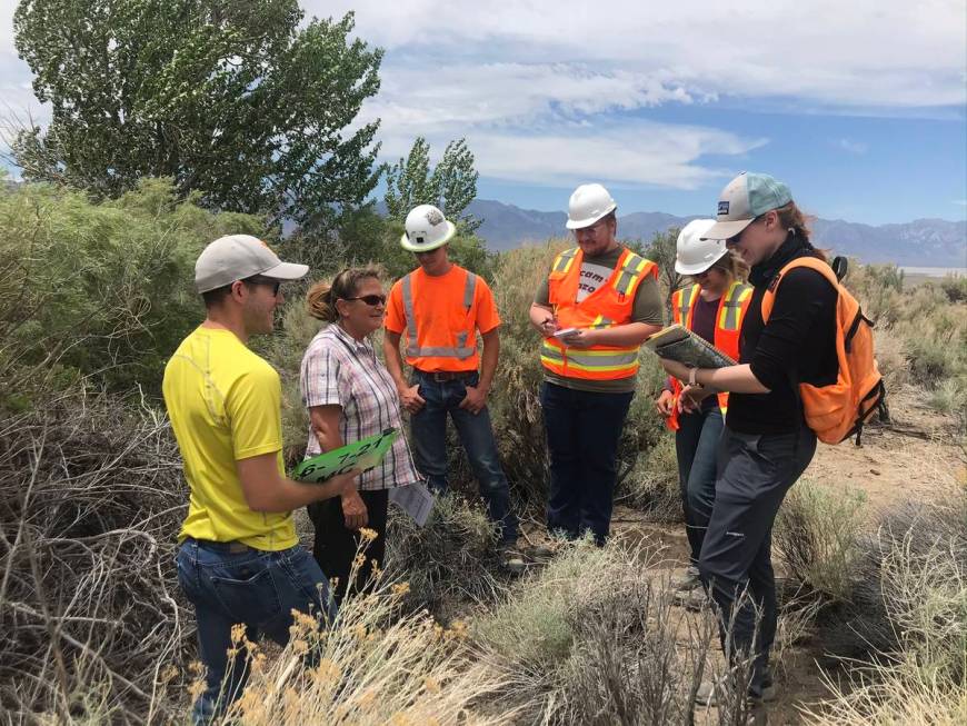 UNLV student Joseph Kolibar, 22, third from right, does field work during a summer internship. ...