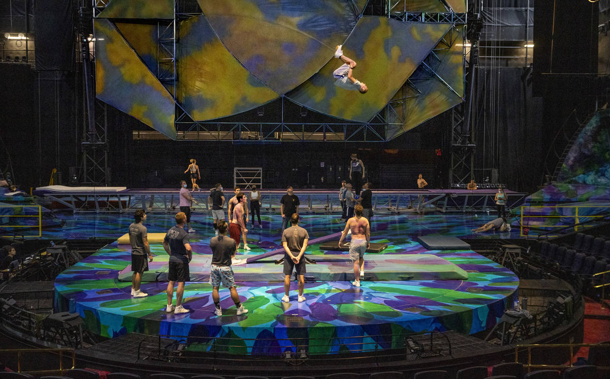 Acrobats practice on a teeter board during rehearsals for "Mystere," a Cirque du Sole ...