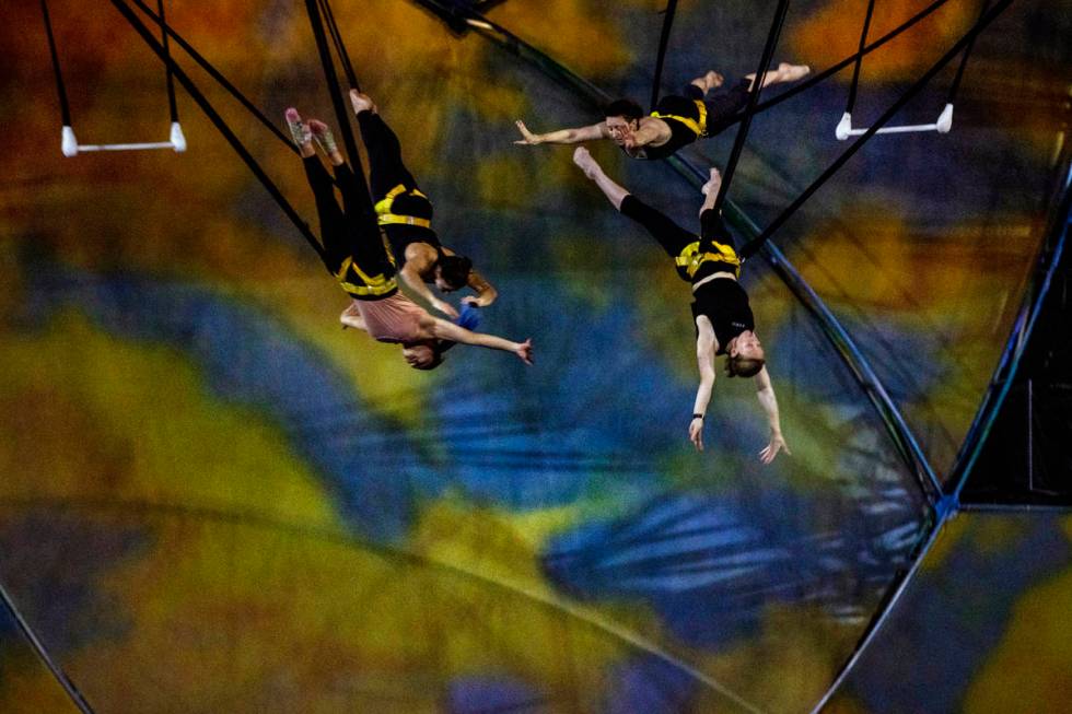 Acrobats rehearse one of several acts in "Mystere," a Cirque du Soleil production whi ...