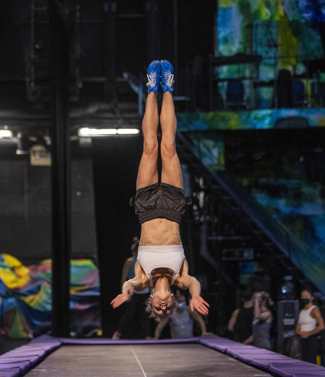 Acrobat Sarah Turner practices flips on a power track trampoline during rehearsals for "My ...