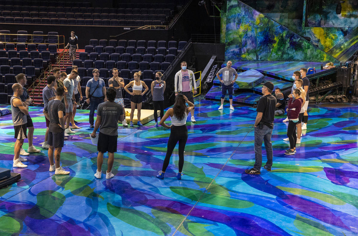 Acrobats gather in conversation during rehearsals for "Mystere," a Cirque du Soleil p ...