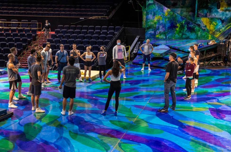 Acrobats gather in conversation during rehearsals for "Mystere," a Cirque du Soleil p ...