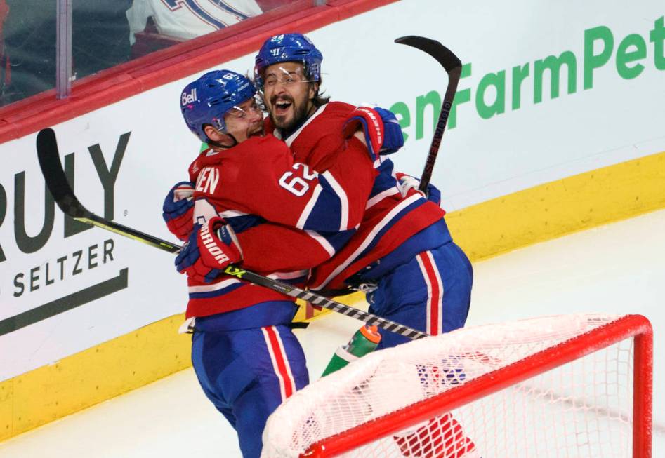 Montreal Canadiens' Artturi Lehkonen (62) celebrates his game-winning goal with teammate Philli ...