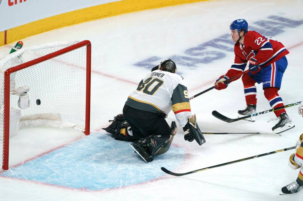 Montreal Canadiens' Cole Caufield (22) scores past Vegas Golden Knights goaltender Robin Lehner ...