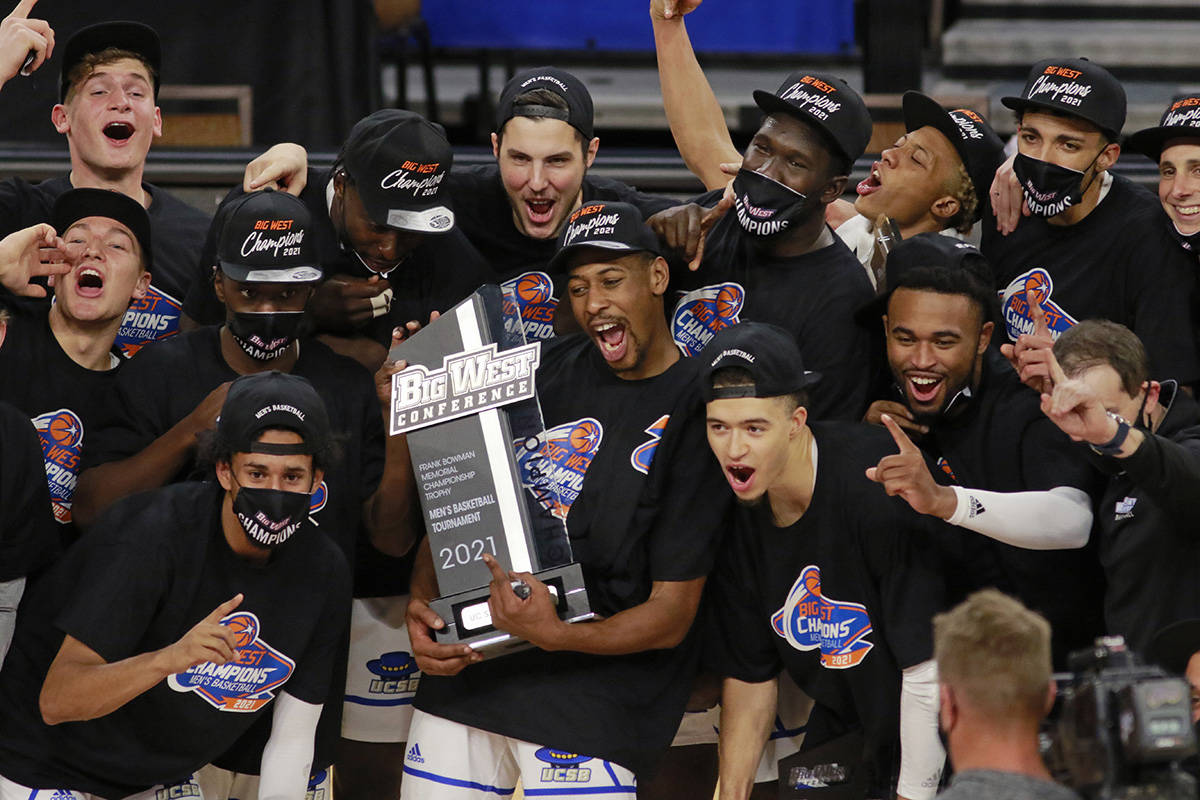 UC Santa Barbara players celebrate their NCAA Big West Conference tournament championship win o ...