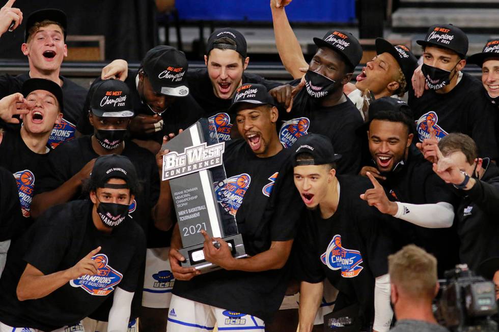 UC Santa Barbara players celebrate their NCAA Big West Conference tournament championship win o ...