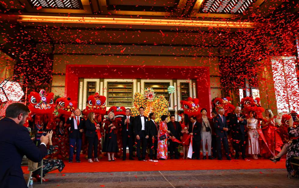 Confetti goes off as the ribbon is cut to mark the opening of Resorts World Las Vegas on Thursd ...