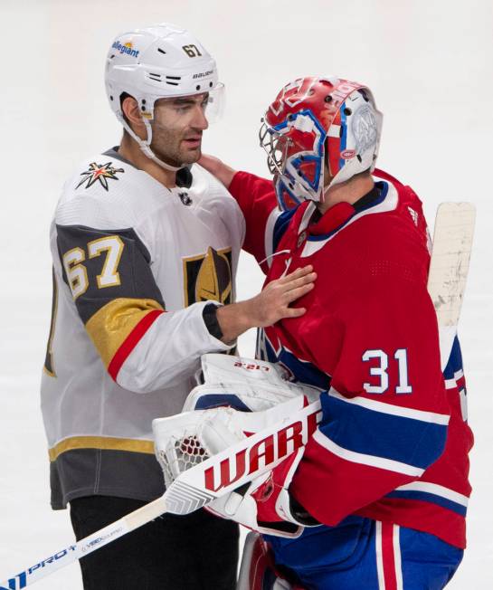 Vegas Golden Knights left wing Max Pacioretty (67) congratulates Montreal Canadiens goaltender ...