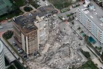 This aerial photo shows part of the 12-story oceanfront Champlain Towers South Condo that colla ...