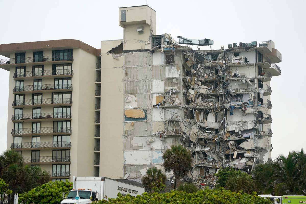 A view of a building is shown after a partial collapse, Thursday, June 24, 2021, in Surfside, F ...