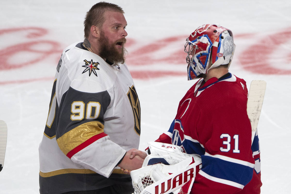 Vegas Golden Knights goaltender Robin Lehner (90) congratulates Montreal Canadiens goaltender C ...