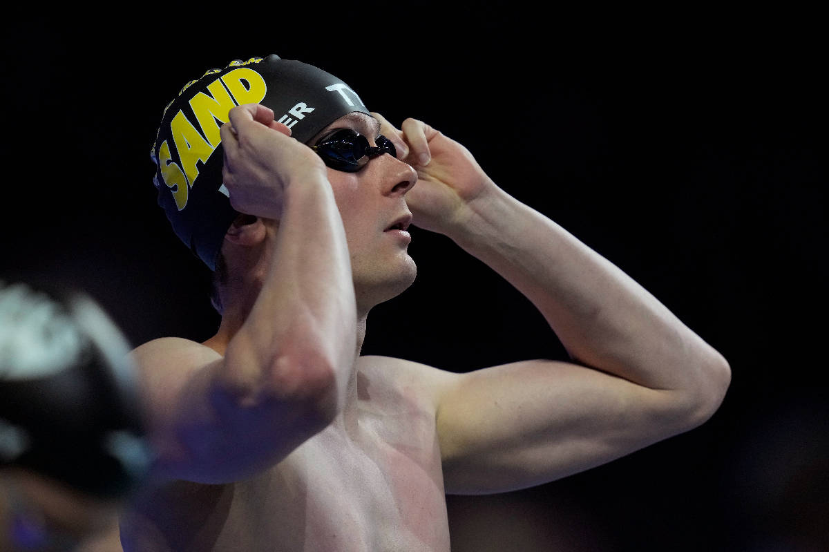 Bowe Becker gets ready to compete in the men's 50-meter freestyle final during wave 2 of the U. ...