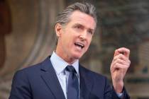Gov. Gavin Newsom speaks during a news conference in Oakland, Calif., in May 2021. (Jessica Chr ...