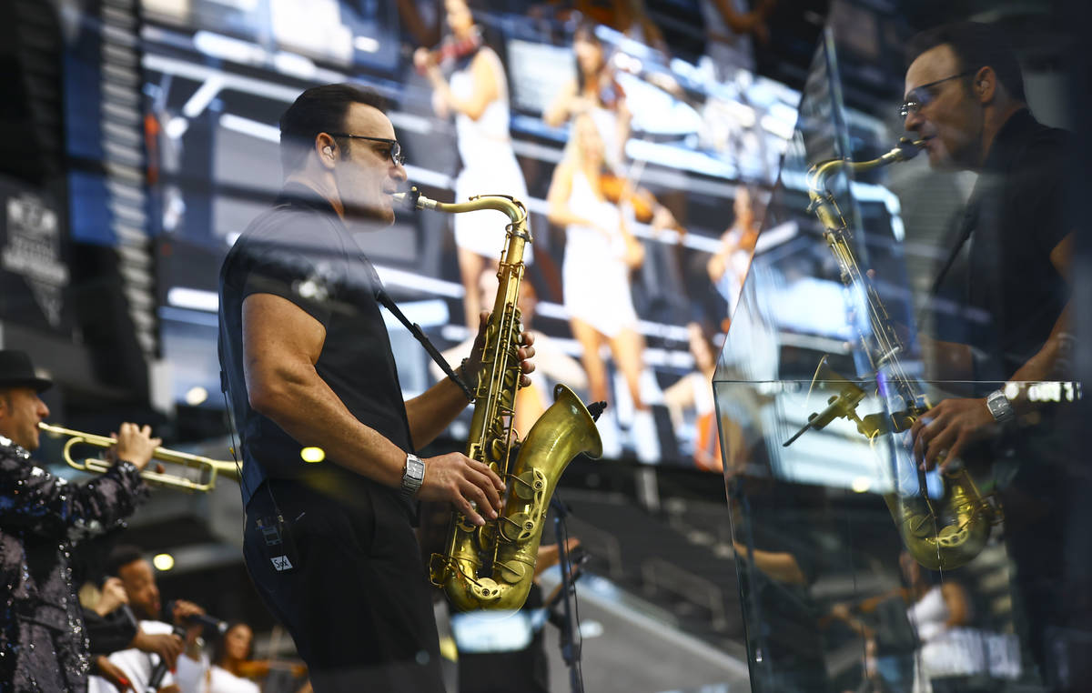 Members of David Perrico's Pop Strings band perform at Allegiant Stadium in Las Vegas on Monday ...