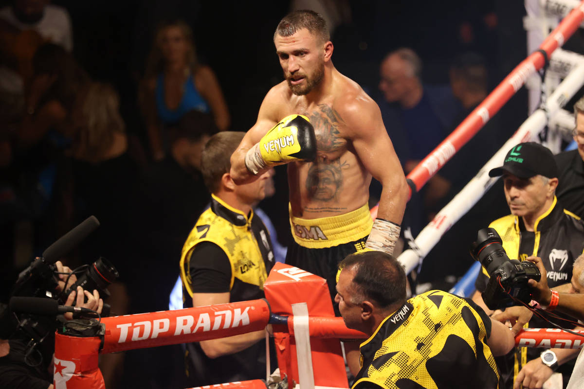 Vasyl Lomachenko celebrates after winning by way of technical knockout in a lightweight bout ag ...