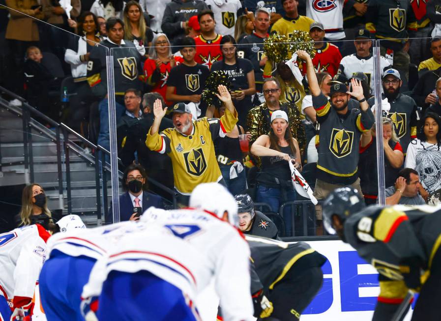 Golden Knights fans cheer during the third period of Game 5 of an NHL hockey Stanley Cup semifi ...