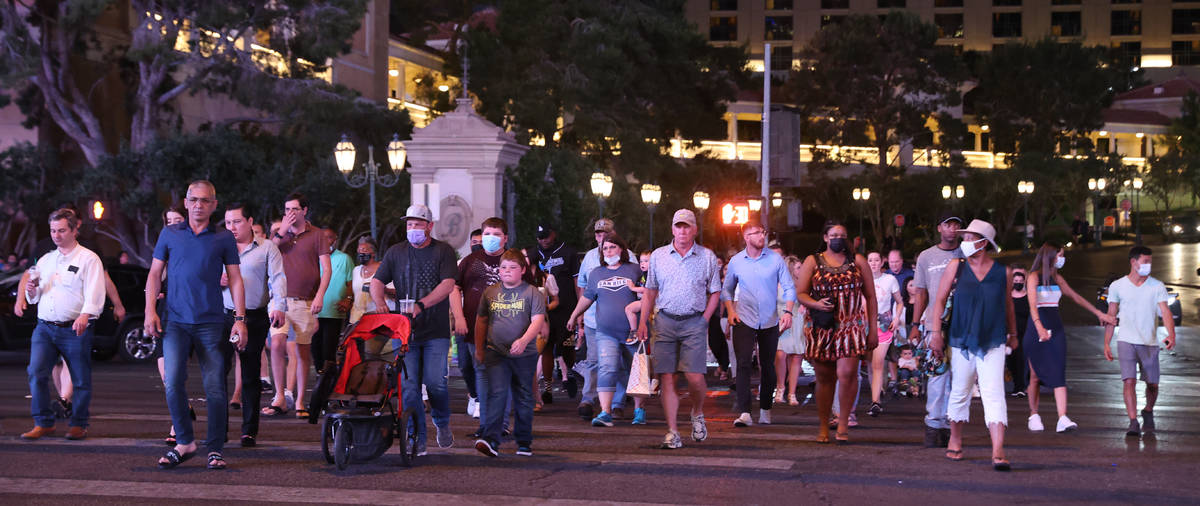 Crowds in front of the Bellagio on the Strip in Las Vegas Friday, May 28, 2021. (K.M. Cannon/La ...