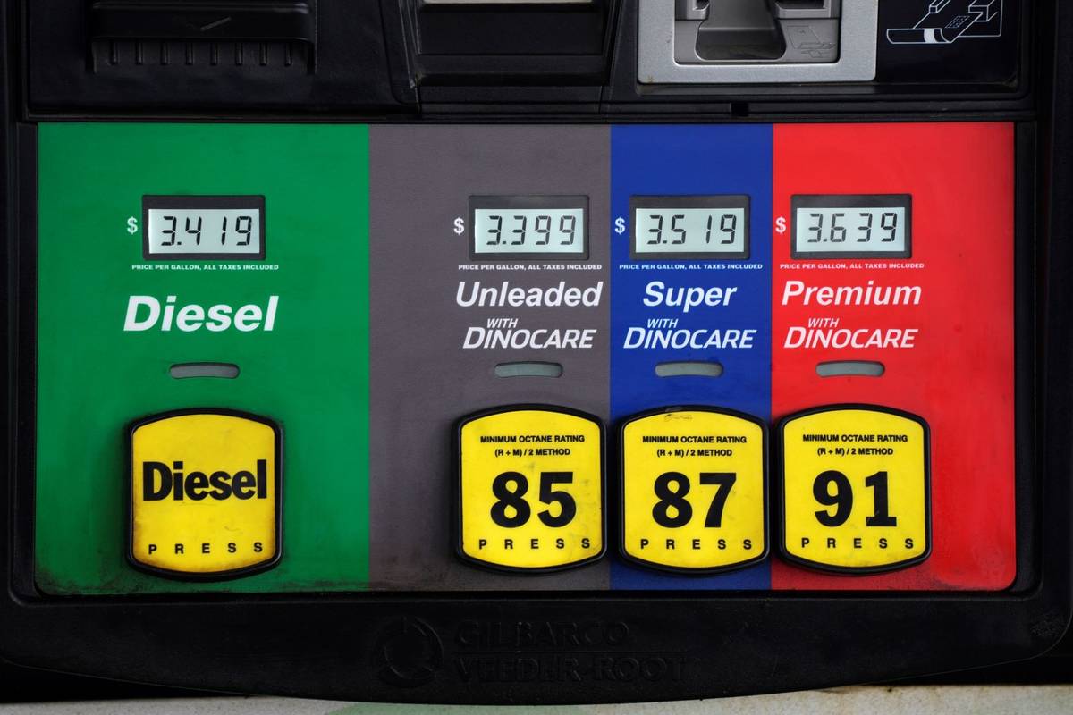 Prices are displayed above the different grades of gasoline available to motorists, Thursday, M ...