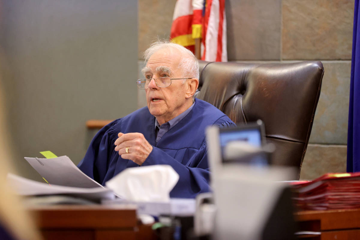 Las Vegas Justice of the Peace Pro Tem William Jansen addresses defendant Jacob Gaona in court ...