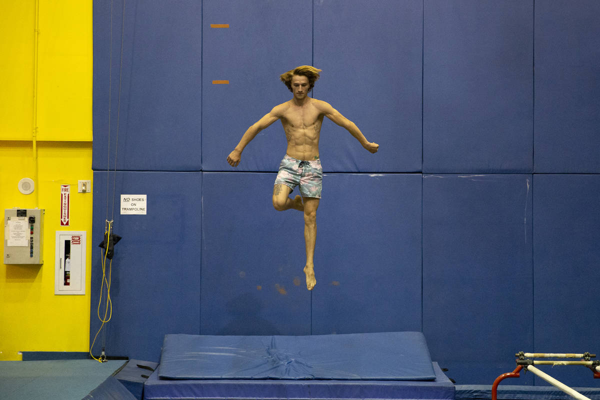 Cirque du Soleil artist Ryan Mitchell trains whlie a rehearsal for "O" is underway in ...