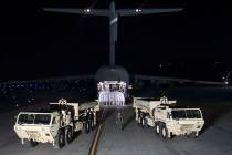Trucks carrying parts of U.S. missile launchers and other equipment needed to set up Terminal H ...