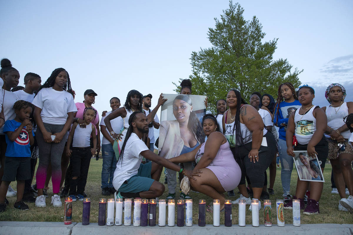 Loved ones of 18-year-old Shania James, who was shot and killed in Las Vegas last week, pose fo ...