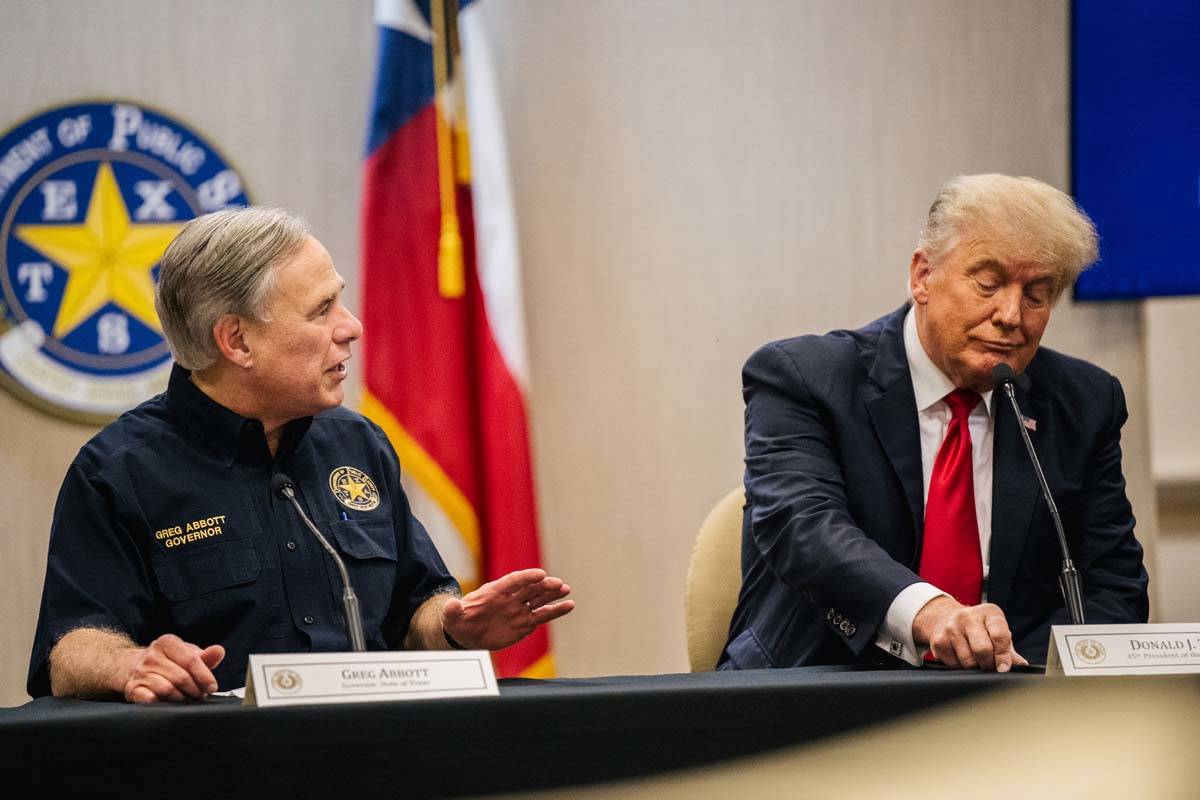 Texas Gov. Greg Abbott addresses former President Donald Trump during a border security briefin ...