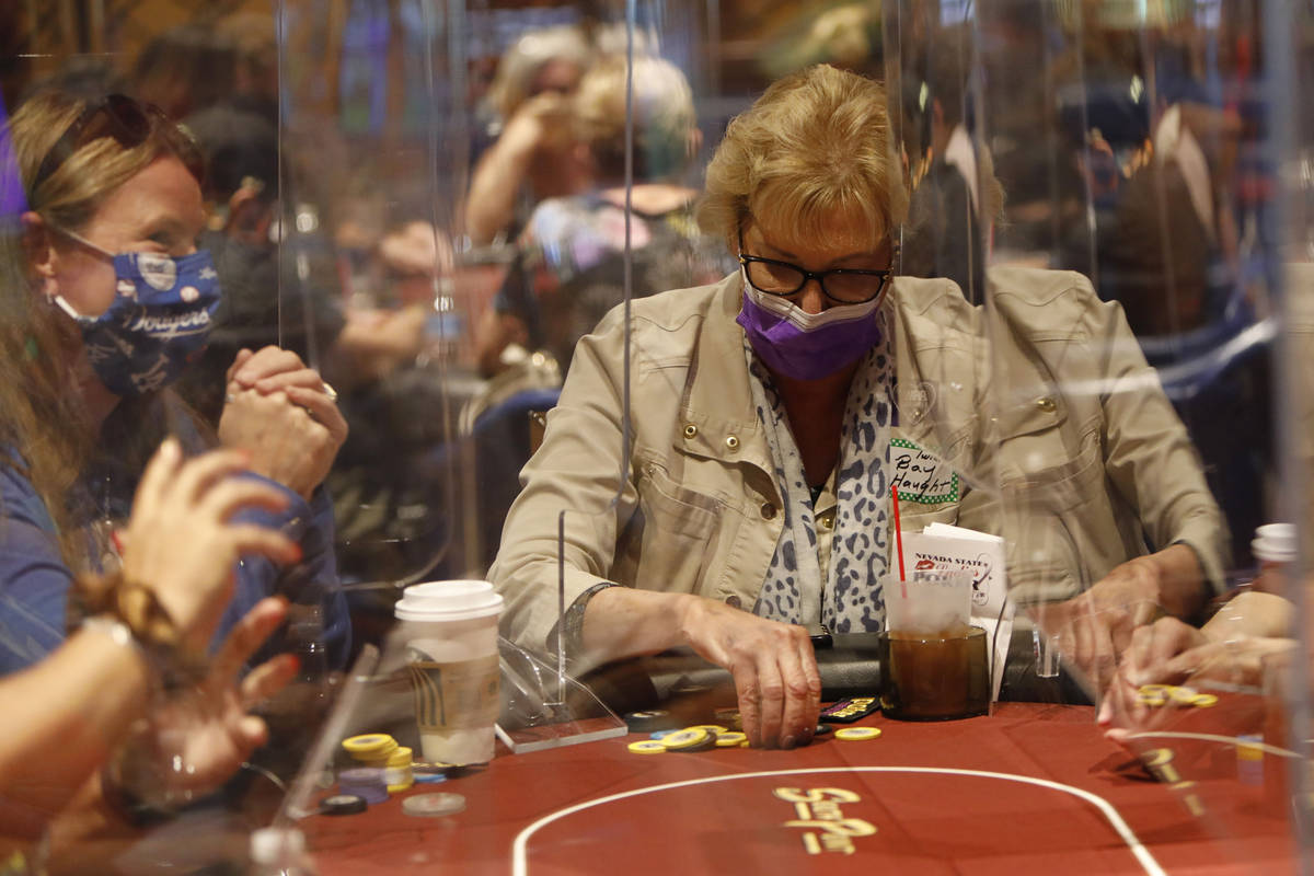 Pam Kocsis of Fresno, Calif., left, and Bay Haught of Chappell Hill, Texas, right, play in $175 ...