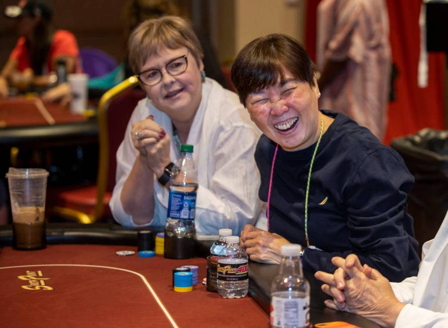Players Wattana Cruz, right, and Susie Braman share laugh in between hands as they compete in t ...