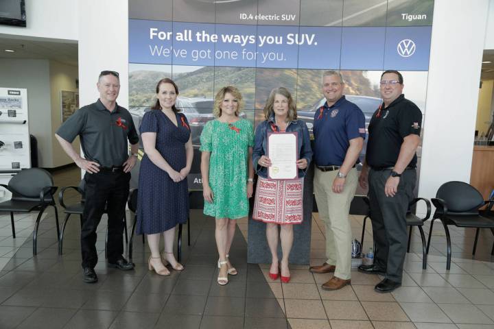 Celebrating the start of the Check Your Seats in the Heat campaign are, from left, Tyler Corder ...