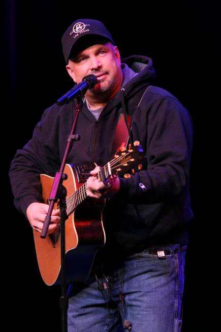 Garth Brooks performs in a one-man show at Encore Theater at Wynn Las Vegas on Dec. 12, 2009. ( ...