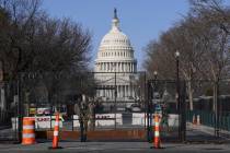 Security fencing surrounds Capitol Hill in Washington, Thursday, March 4, 2021. Capitol Police ...
