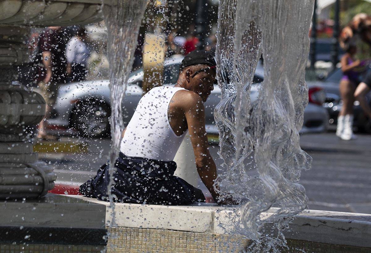 Darrick Washington takes a break at he Venetian fountain, on Friday, June 18, 2021, in Las Vega ...