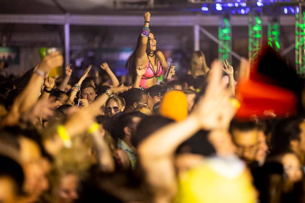 People listen to a performance by DJ Sullivan King at the Downtown Las Vegas Events Center in L ...