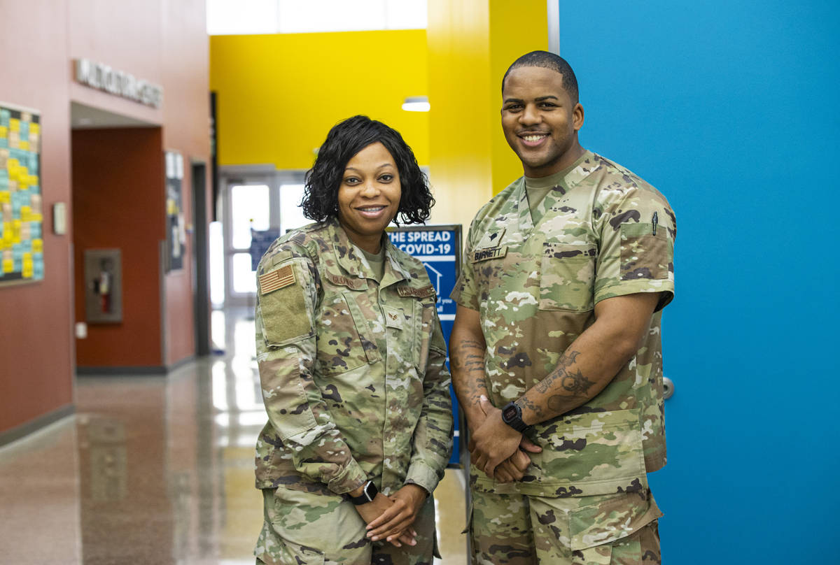 Nevada National Guard Senior Airman Traesha Glover, left, and Spc. Demetrie Barnett pose for a ...