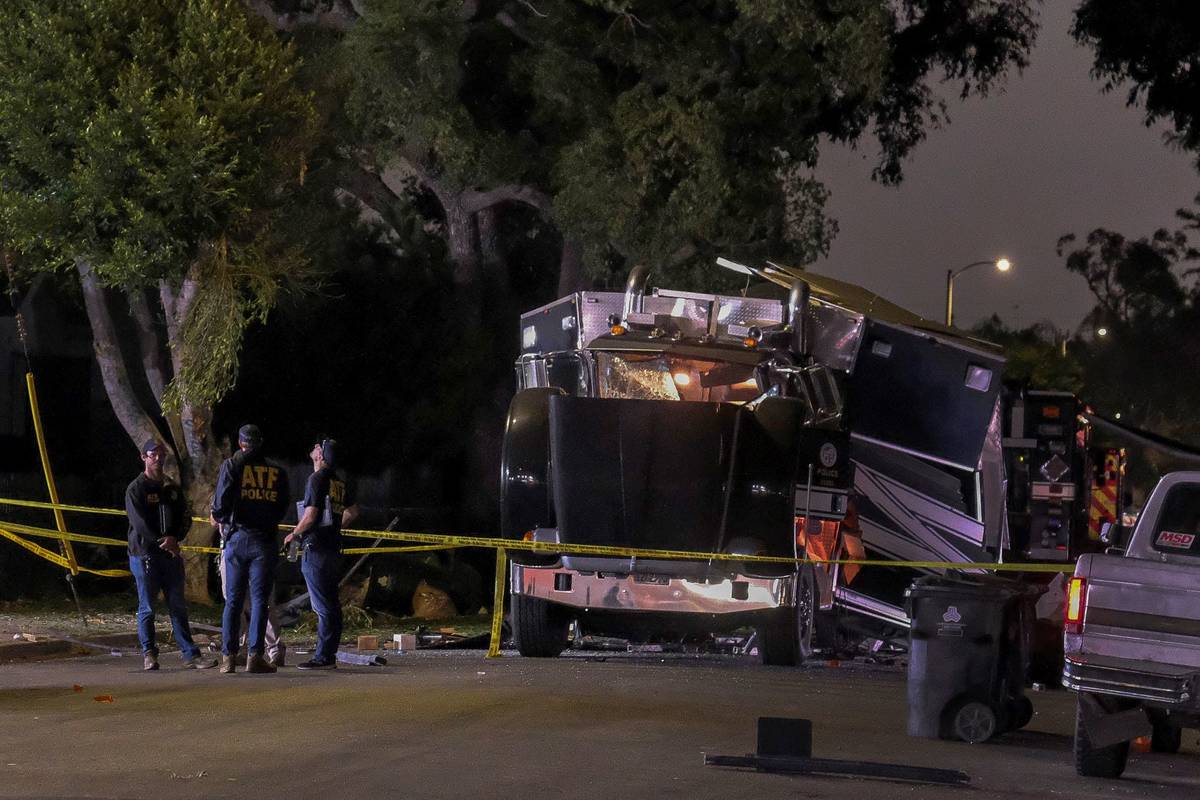 The remains of an armored Los Angeles Police Department tractor-trailer are seen after firework ...