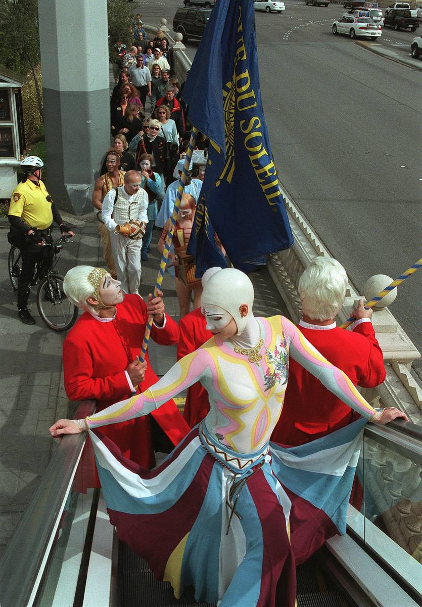 news--Performers from the shows "O" and Mystere, held an impromptu parade and street ...