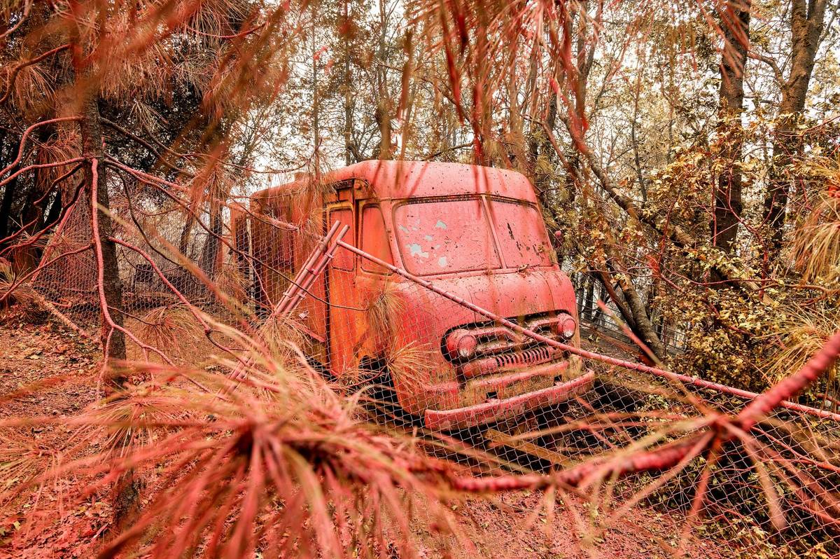Fire retardant coats a vehicle in the Lakehead-Lakeshore community of unincorporated Shasta Cou ...