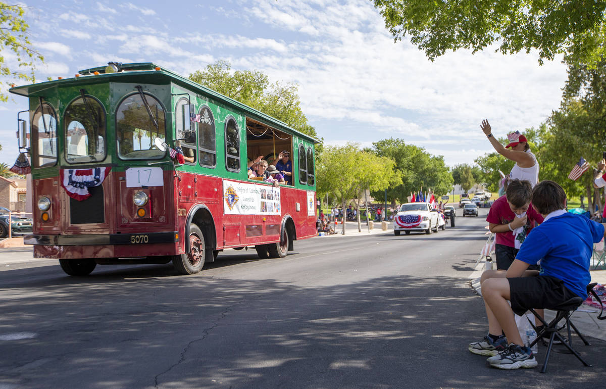 The Knights of Columbus trolley car passes on Nevada Way during the two-day Damboree event on S ...
