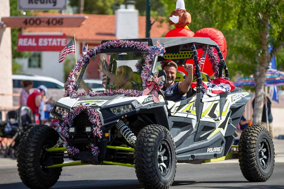 A dune buggy passes through the parade route during the two-day Damboree event on Saturday, Jul ...