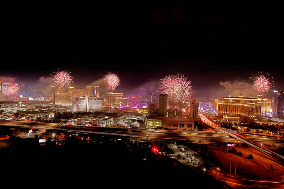 Fireworks explode above the Las Vegas skyline, as seen from the VooDoo Rooftop Nightclub at the ...