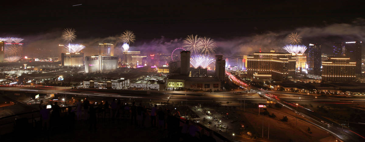 Fireworks explode above the Las Vegas skyline, as seen from the VooDoo Rooftop Nightclub at the ...