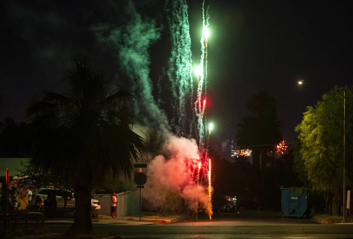 Fireworks go in a neighborhood near downtown Las Vegas in on Sunday, July 4, 2021. (Chase Steve ...