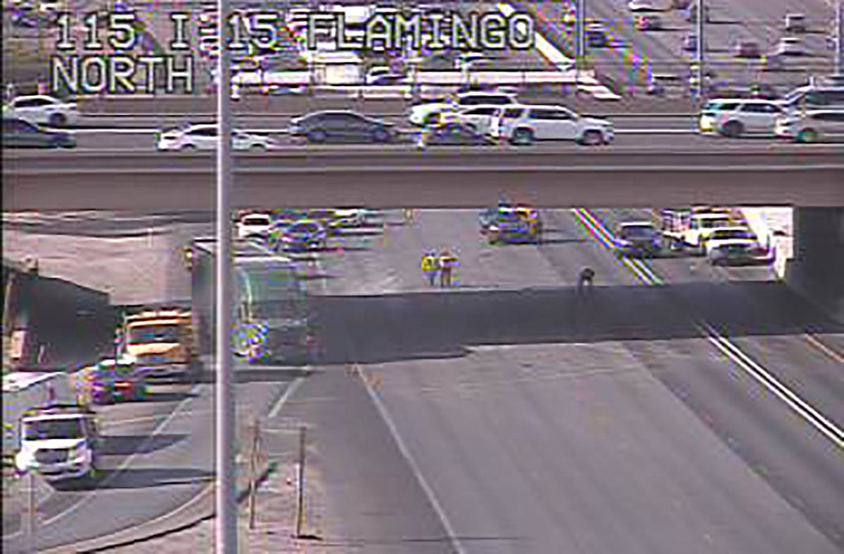 Traffic makes an exit from southbound Interstate 15 at the Flamingo Road east offramp about 5:2 ...