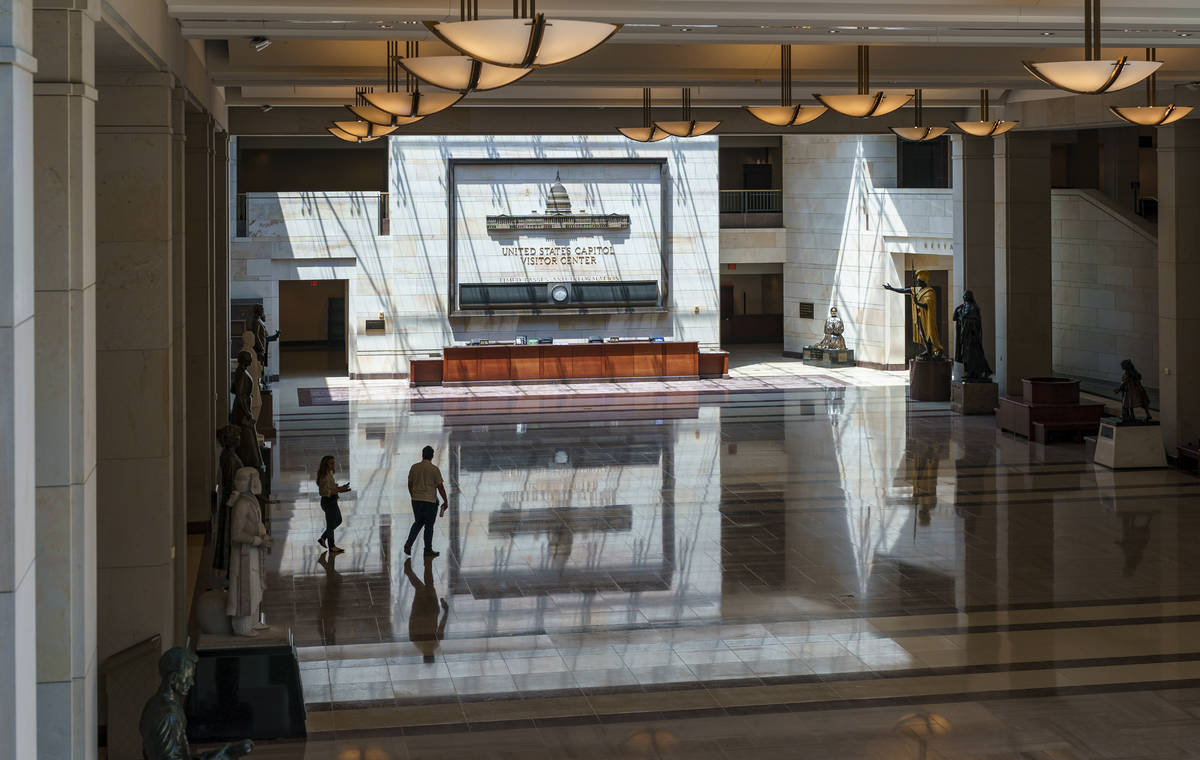 This June 29, 2021, photo shows the empty U.S. Capitol Visitor Center, closed since the COVID-1 ...