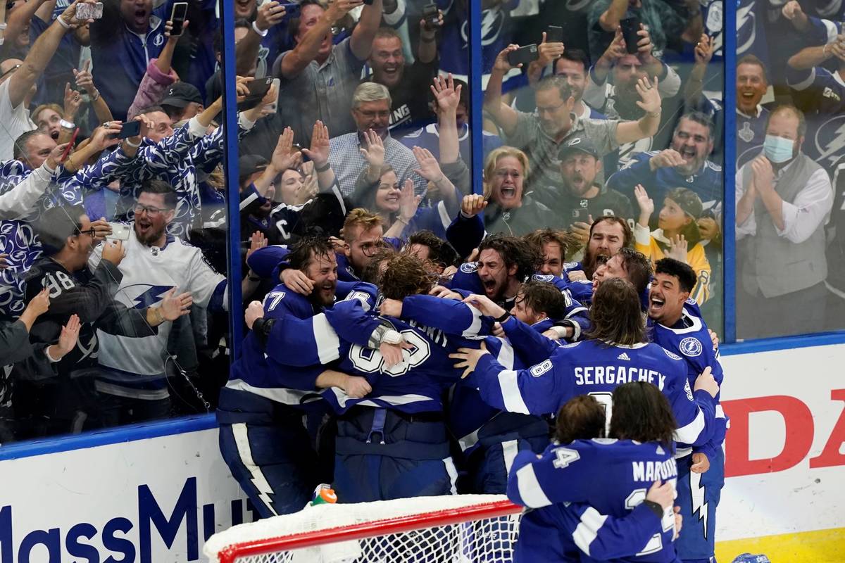 The Tampa Bay Lightning celebrate their series win over the Montreal Canadiens to clinch the St ...