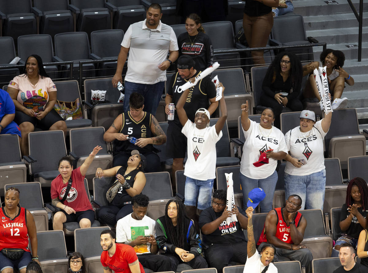 Las Vegas Aces fans react to the big screen during a WNBA game against the Phoenix Mercury at M ...