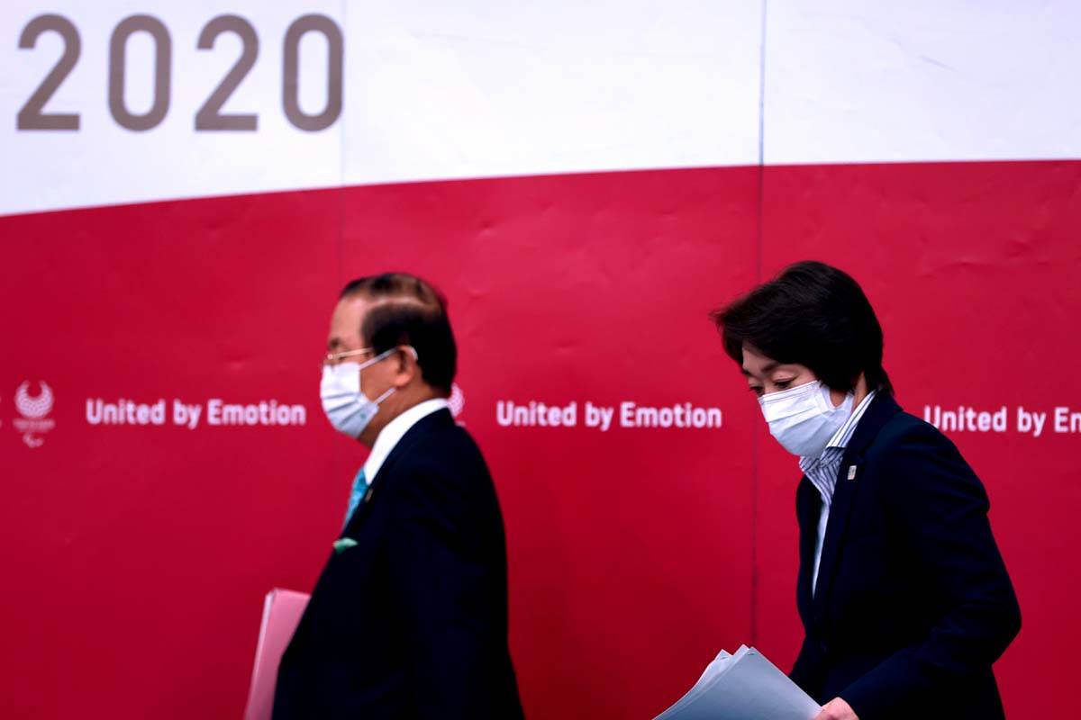 Tokyo 2020 president Seiko Hashimoto, right, and CEO Toshiro Muto attend a press conference, in ...